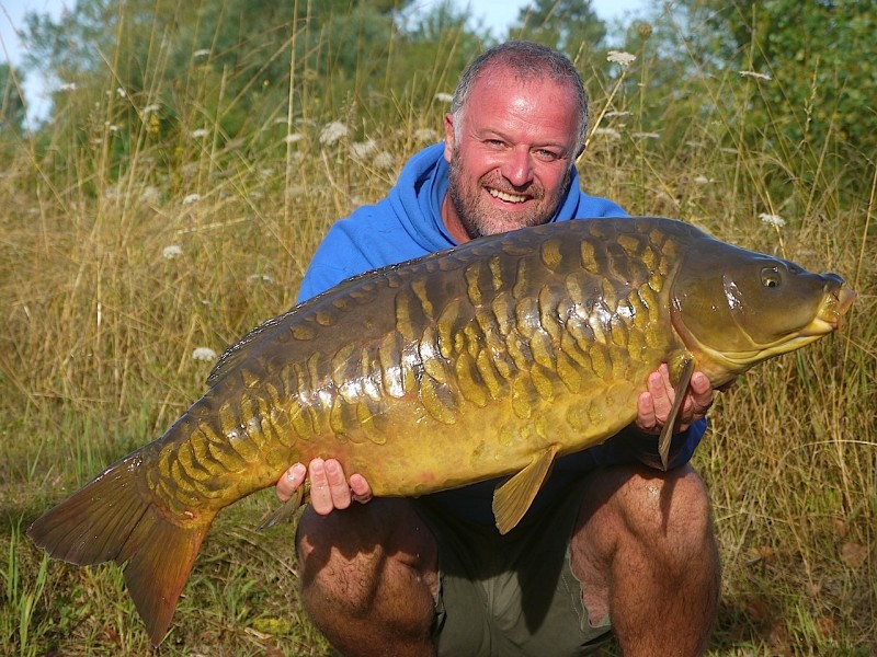 Barty with "patched fully" 39.12lb Stock Pond July 2013