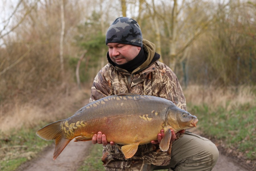 Wez Rowley with "The Naked One" ..........lovely looking fish........